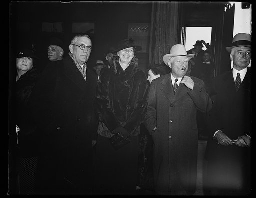 AWAITING THE CHIEF. MRS. ROOSEVELT AND VICE PRESIDENT JOHN NANCE GARNER ARE SHOWN HERE AWAITING THE ARRIVAL OF PRESIDENT ROOSEVELT AT UNION STATION AS HE RETURNED FROM HIS VACATION IN GEORGIA. THIS IS GARNER'S FIRST DAY AT THE CAPITAL