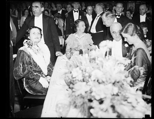 FIRST LADY AT DANCE. MRS. ROOSEVELT, AT LEFT, AND HER PARTY AS THEY ATTENDED THE PRESIDENT ROOSEVELT BIRTHDAY BALL AT THE SHOREHAM HOTEL. FROM THE LEFT: MRS. ROOSEVELT; ASSISTANT SECRETARY OF THE NAVY HENRY L. ROOSEVELT; RAY BAKER, CHAIRMAN OF THE BALLADOR OSWALDO ARANHA, CENTER, AND PRESIDENT ROOSE