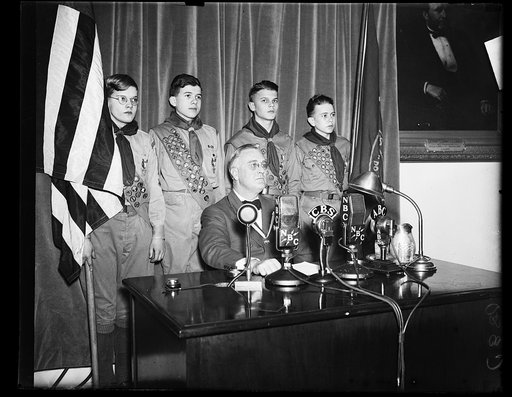 PRESIDENT CONGRATULATES BOY SCOUTS. A SHORT RADIO ADDRESS WAS GIVEN BY PRESIDENT ROOSEVELT CONGRATULATING THE BOY SCOUTS ON THE 25TH ANNIVERSARY OF THEIR FOUNDING. FROM THE LEFT: BOLTON SMITH, VICE PRESIDENT OF B.S.A.; SYDNOR HODGES TROOP 97; GEORGE KEPHART, TROOP 33; LLOYD STREET TROOP 14; PHILIP C