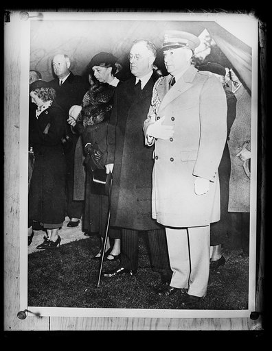 PRESIDENT AT HOLMES FUNERAL. PRESIDENT ROOSEVELT ATTENDS THE FUNERAL OF THE LATE JUSTICE OLIVER WENDELL HOLMES. FROM THE LEFT: PMG JAMES FARLEY, MRS. ROOSEVELT, PRESIDENT ROOSEVELT, AND THE WHITE HOUSE MILITARY ATTACHE, COL. E.M. WATSON