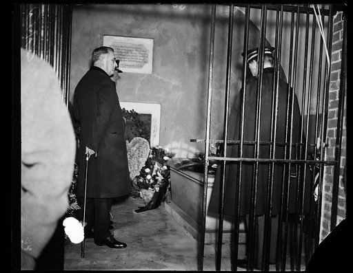 ROOSEVELT AT WASHINGTON'S TOMB. PRESIDENT FRANKLIN D. ROOSEVELT TODAY ARRANGED ONE SIMPLE CEREMONY AS HIS PART IN COMMEMORATING THE 203RD ANNIVERSARY OF GEORGE WASHINGTON'S. THE PRESIDENT LOOKS ON WHILE COL. EDWIN WATSON, AIDE TO THE PRESIDENT, PLACES WREATH ON FIRST PRESIDENT'S TOMB
