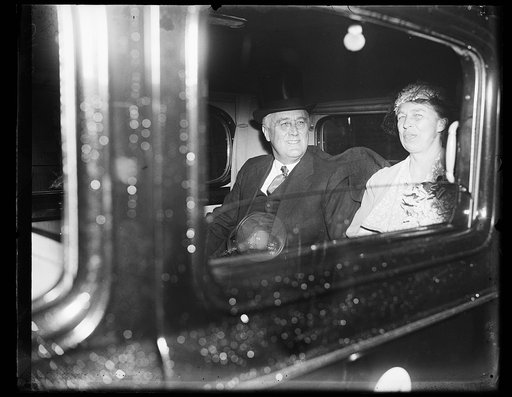 PRESIDENT AND MRS. ROOSEVELT IN THEIR CAR AFTER ENJOYING EASTER SERVICE AT ST. THOMAS EPISCOPAL CHURCH ON THEIR WAY BACK TO THE WHITE HOUSE