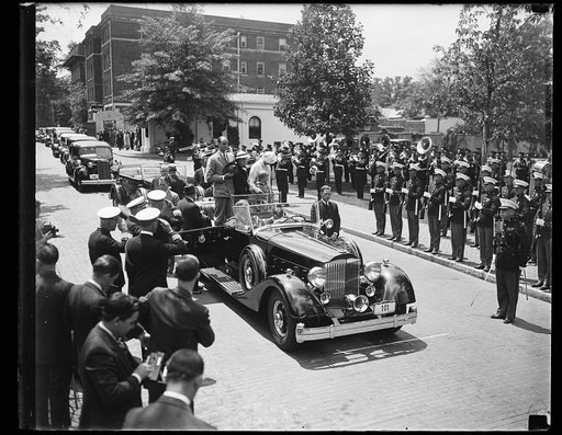 MIDDIES GREET PRESIDENT. MIDSHIPMEN GREET PRESIDENT ROOSEVELT. MR. AND MRS. JAMES ROOSEVELT; BUZZIE DALL AND MRS. FRANKLIN ROOSEVELT STAND IN THE REAR COMPARTMENT OF THE CAR. PRESIDENT ROOSEVELT IS SEATED IN FRONT. STRIPES AND THE STAR ON THE CUFF OF REAR ADMIRAL D.F. SELLER, COMMANDANT OF U.S.N.A.,