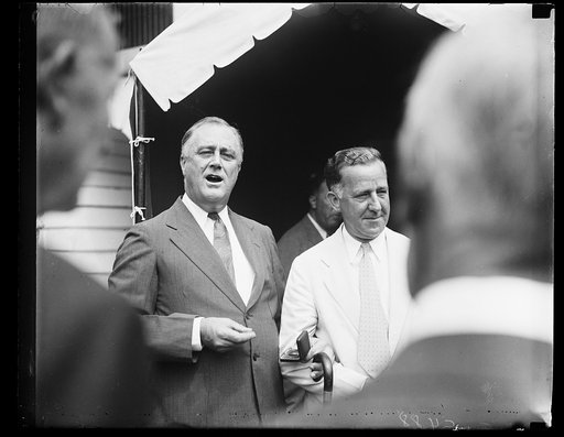 BIG STICK MAN. PRESIDENT ROOSEVELT, IN THIS PHOTOGRAPH MADE TODAY, LOOKS HALE AND HEARTY AS HE COMPLETES HIS 'BIG STICK' ACT WHICH RESULTED IN CONGRESS JUMPING THROUGH THE HOOPS OF HIS MUST LEGISLATIVE PROGRAM WITH BUT MINOR HITCHES