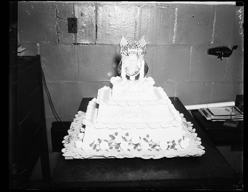 PRESIDENT'S BIRTHDAY CAKE MADE BY SANITARY GROCERY CO.