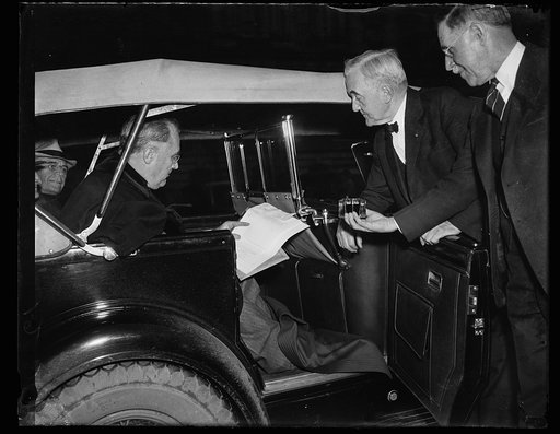 SIGNED ON THE WING. WASHINGTON, D.C. MARCH 19. PRESIDENT ROOSEVELT STOPPED LONG ENOUGH ON HIS TOUR OF THE WASHINGTON FLOOD AREA TO SIGN A BILL CREATING A NATIONAL PARK ON THE DANIEL FREEMAN HOMESTEAD IN GAGE COUNTY, NEBRASKA. SEN. GEORGE NORRIS, (R-NE), IS SPONSOR OF THE BILL IN THE SENATE. FROM THE