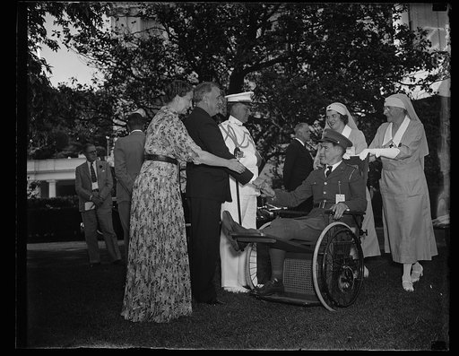 PRESIDENT AND MRS. ROOSEVELT ENTERTAIN DISABLED VETERANS AT GARDEN PARTY. WASHINGTON, D.C., MAY 21. DISABLED VETERANS CONFINED IN THE HOSPITALS IN AND AROUND WASHINGTON WERE ENTERTAINED BY PRESIDENT AND MRS. ROOSEVELT AT A GARDEN PARTY TODAY ON THE GROUNDS OF THE WHITE HOUSE. PRESIDENT ROOSEVELT IS 