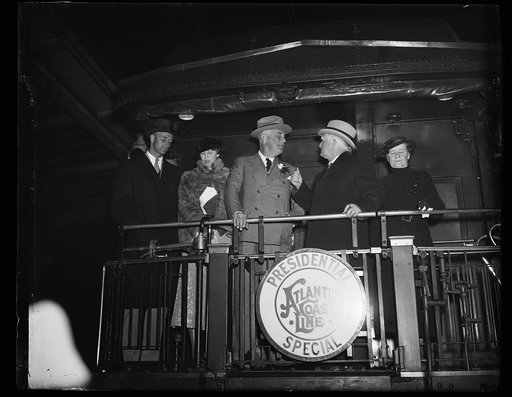 PRESIDENT RETURNS TO WASHINGTON. WASHINGTON, D.C. DECEMBER 5. PRESIDENT ROOSEVELT RETURNED FROM BUENOS AIRES TODAY. HE WAS MET AT THE STATION BY MRS. ROOSEVELT, VICE PRESIDENT AND MRS. GARNER, AND MEMBERS OF HIS CABINET. IN THE PHOTOGRAPH, L TO R: MRS. GARNER, VICE PRESIDENT GARNER, PRESIDENT ROOSEV