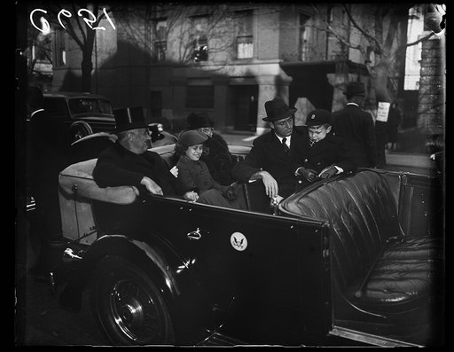 PRESIDENT ATTENDS CHURCH. WASHINGTON, D.C. DECEMBER 25. PRESIDENT AND THE PRESIDENTIAL FAMILY ATTEND SERVICES HERE IN WASHINGTON ON CHRISTMAS DAY, PHOTO SHOWS, L TO R IN THE CAR: THE PRESIDENT, SISTIE DALL, MRS. JAMES ROOSEVELT, THE PRESIDENT'S MOTHER, JAMES ROOSEVELT, AND BUZZIE DALL