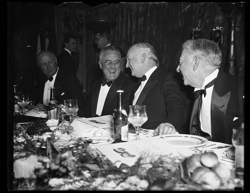 PRESIDENT ENJOYS DEMOCRATIC VICTORY FEAST. WASHINGTON, D.C., MARCH 4. IN FINE FORM AND FLASHING THE TYPICAL 'ROOSEVELT' SMILE, PRESIDENT ROOSEVELT HEADED THE THOUSAND OR MORE LOYAL DEMOCRATS ATTENDING THE HUNDRED-DOLLAR-A-PLATE VICTORY FEAST TONIGHT AT THE MAYFLOWER HOTEL IN WASHINGTON. FIVE DOLLARS