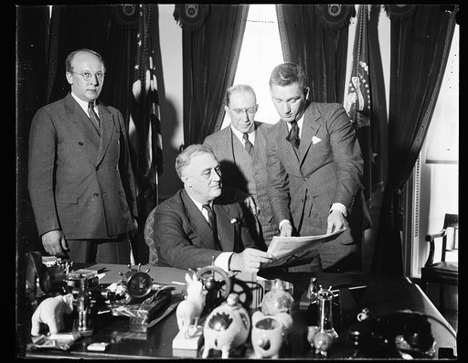PRESIDENT RECEIVES CCC ESSAY WINNER. WASHINGTON, D.C. APRIL 6. WINNER OF THE NATIONAL ESSAY CONTEST CONDUCTED BY 'HAPPY DAYS', OFFICIAL PAPER OF THE CIVILIAN CONSERVATION CORPS, P.J. O'DONNELL, CCC COMPANY 1161 OF WOONSOCKET, RI, WAS PRESENTED TO PRESIDENT