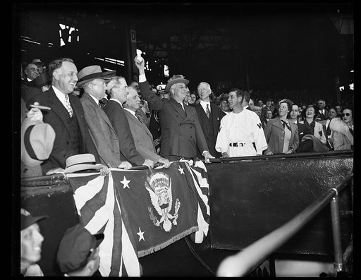 PRESIDENT OPENS 1937 BASEBALL SEASON. WASHINGTON, D.C., APRIL 19. PRESIDENT ROOSEVELT PRIED OFF THE LID OF THE 1937 BASEBALL SEASON IN WASHINGTON TODAY WHEN HE THREW OUT THE FIRST BALL TO START THE GAME BETWEEN THE WASHINGTON SENATORS AND THE PHILADELPHIA ATHLETICS. IN THE PHOTOGRAPH, L TO R: MARVIN