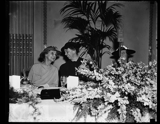 FIRST LADY AND WIFE OF CHIEF JUSTICE BREAKFAST TOGETHER. WASHINGTON, D.C. APRIL 22. BREAKFASTING TODAY AS GUESTS OF THE CONGRESSIONAL CLUB, MRS. ROOSEVELT AND MRS. CHARLES EVANS HUGHES, WIFE OF THE CHIEF JUSTICE, SEEMED TO BE ENJOYING AN 'OFF-THE-RECORD' CHAT. MAYBE THEY'RE DISCUSSING THE PACKING OF