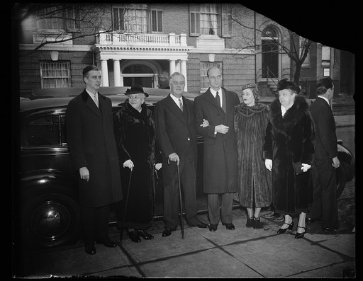 ROOSEVELT FAMILY ATTENDS XMAS SERVICES. WASHINGTON, D.C. DECEMBER 25. SPONSORED BY THE WASHINGTON FEDERATION OF CHURCHES, THE ANNUAL UNION SERVICE OF THE PROTESTANT DENOMINATIONS WAS HELD TODAY AT THE COVENANT-FIRST PRESBYTERIAN CHURCH. THE NATION'S #1 CITIZEN IS SHOWN WITH HIS FAMILY AS HE ENTERED 