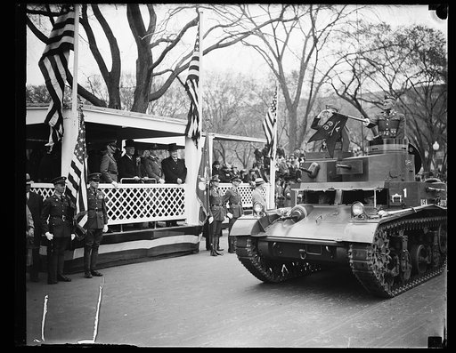 PRESIDENT ROOSEVELT REVIEWS ARMY DAY PARADE. WASHINGTON, D.C. APRIL 6. PRESIDENT ROOSEVELT LED THE NATION TODAY IN OBSERVING ARMY DAY AS HE REVIEWED A COLORFUL PARADE COMPRISED OF VIRTUALLY EVERY ARM OF THE SERVICE. RUMBLING OF THE GIANT TANKS REVIVED MEMORIES OF AMERICA'S ENTRY INTO THE WORLD WAR T