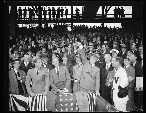 PRESIDENT THROWS OUT FIRST BALL. THE LID OF THE 1938 BASEBALL SEASON IN THE CAPITAL WAS PRIED OFF TODAY BY PRESIDENT ROOSEVELT AS HE TOSSED OUT THE FIRST BALL TO START THE GAME BETWEEN THE WASHINGTON SENATORS AND THE PHILADELPHIA ATHLETICS. IN THE PHOTOGRAPH, L TO R: AL KRESS OF SARATOGA SPRINGS, N.