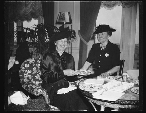 WIVES OF NATION'S LEADERS, WASHINGTON, D.C. JANUARY 10. MRS. FRANKLIN D. ROOSEVELT AND MRS. JOHN N. GARNER PICTURED AT A LUNCHEON OF THE SENATE LADIES CLUB TODAY, THE FIRST OF THE 76TH CONGRESS. MRS. GARNER WAS HOSTESS TO MEMBERS OF THE CLUB AT THE WASHINGTON HOTEL