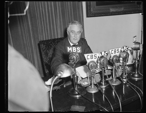 A SERIOUS PRESIDENT BROADCASTS TO THE NATION ON THE EUROPEAN WAR CRISIS, WASHINGTON, D.C. SEPTEMBER 3. PRESIDENT ROOSEVELT APPEARED TENSE AND SERIOUS TONIGHT AS HE BROADCAST A NATION-WIDE MESSAGE DESIGNED TO ALLAY AND RELIEVE THE SUSPENSE PRODUCED BY THE EUROPEAN WAR CRISIS