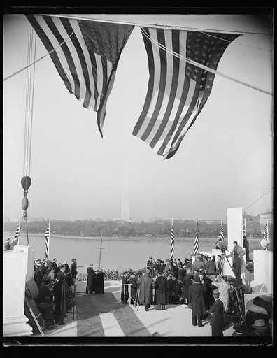 MEMORIAL TO JEFFERSON ON BANKS OF TIDAL BASIN FORMALLY GIVEN CORNERSTONE. WASHINGTON, D.C. NOVEMBER 15. GENERAL VIEW OF THE SCENE AT LAYING OF THE CORNERSTONE OF THE NEW THOMAS JEFFERSON MEMORIAL ON THE BANKS OF THE TIDAL BASIN IN WASHINGTON. PRESIDENT ROOSEVELT IS SHOWN SPEAKING FROM THE STAND IN T