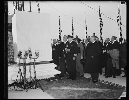 PRESIDENT LAYS CORNERSTONE OF NEW JEFFERSON MEMORIAL. PRESIDENT ROOSEVELT LAYING THE CORNERSTONE OF THE NEW JEFFERSON MEMORIAL ON THE BANKS OF THE POTOMAC RIVER. THE EDIFICE WHEN COMPLETED WILL HAVE COST $13,000,000. WITH THE PRESIDENT IS CAPT. DANIEL CALLAGHAN, WHITE HOUSE NAVAL AIDE