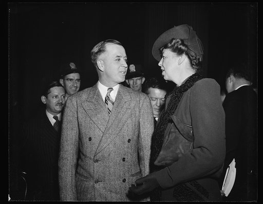 FIRST LADY CHATS WITH ACTING HEAD OF DIES COMMITTEE. WASHINGTON, D.C. NOVEMBER 30. FOLLOWING HER UNANNOUNCED APPEARANCE AT THE DIES COMMITTEE HEARING TODAY, MRS. ROOSEVELT STAYED TO CHAT WITH ACTING CHAIRMAN REP. JOE STARNES, WHEN THE MORNING SESSION ADJOURNED. THE FIRST LADY LISTENED TO TESTIMONY C