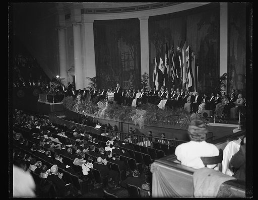 PRESIDENT ROOSEVELT ADDRESSES SCIENCE PARLEY. WASHINGTON, D.C. MAY 10. A GENERAL VIEW OF CONSTITUTION HALL TONIGHT AS PRESIDENT ROOSEVELT ADDRESSED MEMBERS OF THE EIGHTH AMERICAN SCIENTIFIC CONGRESS. DELEGATES FROM THE PAN AMERICAN NATIONS HEARD THE PRESIDENT'S COMMENTS ON THE GERMAN INVASION OF HOL