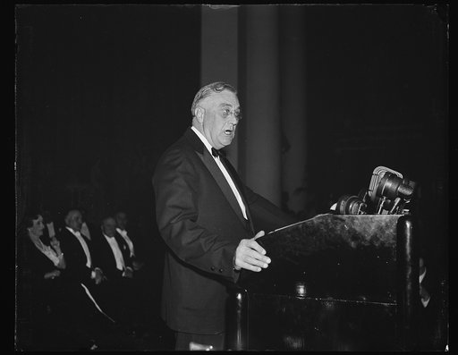 PRESIDENT SPEAKS ON BELGIAN INVASION. WASHINGTON, D.C. MAY 10. PRESIDENT ROOSEVELT TONIGHT ADDRESSED THE EIGHTH AMERICAN SCIENTIFIC CONGRESS AT CONSTITUTION HALL AFTER ONE OF THE BUSIEST DAYS IN HIS ADMINISTRATION FOLLOWING THE GERMAN INVASION OF BELGIUM, HOLLAND, AND LUXEMBOURG. SEEMING WEARY, HE T