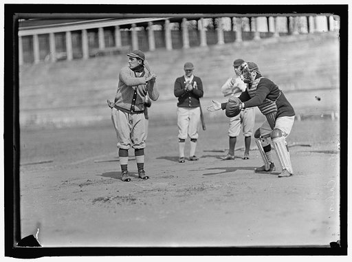 Jack Calvo at bat, Vic Bickers (maybe) in dark sweater holding bat, Al Scheer left of catcher, Washington AL, at University of Virginia, Charlottesville (baseball)