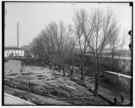 Temporary building, under construction, built in 1917, for the war. Washington monument in background. Located between B Street (now Constitution Ave.), 19th Street, Virginia Ave., and 18th Street, N.W., Washington, D.C.