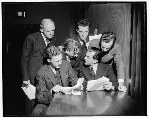 The penthouse studio for radio broadcasts on the roof of the Interior Building consists of reception room, office, script writers' room, small and large studios, and sound control room. These actors are members of the cast for My Dear Mr. President, a play based upon the President's budget message [