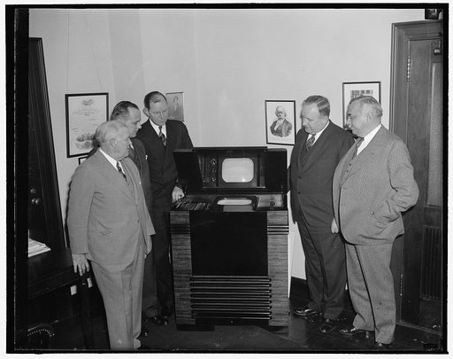 FCC Commissioners inspect latest in television. Washington, D.C., Dec. 1. The first public demonstration of the new lightweight television equipment was given today before members of the Federal Communications Commission. The new equipment is portable and can be carried in a taxicab as compared to t