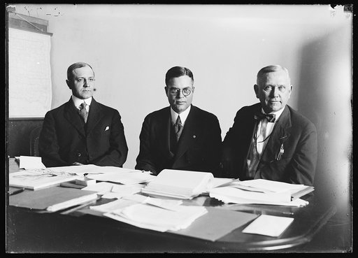 Henry C. Wallace, center
