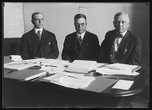 Henry C. Wallace, center