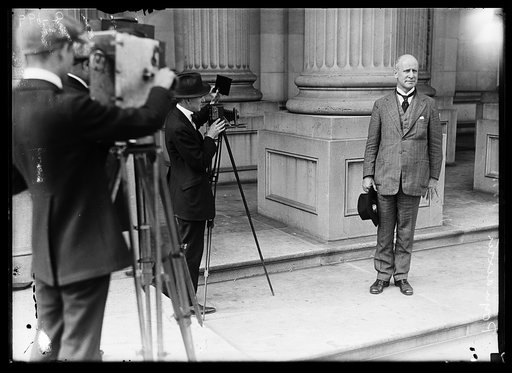 Miles Poindexter posing for photographers at U.S. Capitol, Washington, D.C.