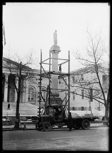 Statue of Lincoln? on top of column