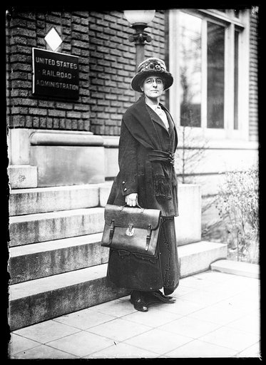 Woman in front of United States Railroad Administration building