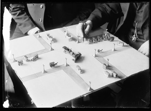Automobile accident recreation with miniature cars?