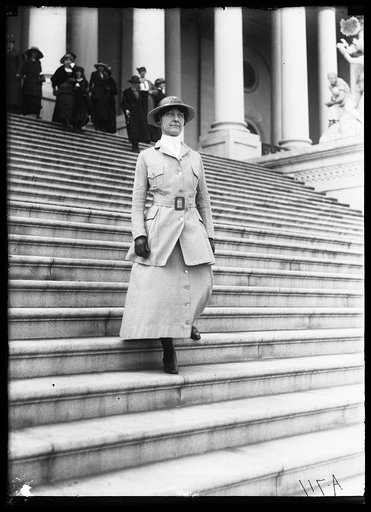 Woman on steps of U.S. Capitol, Washington, D.C.