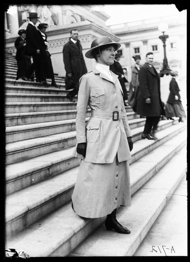 Woman on steps of U.S. Capitol, Washington, D.C.