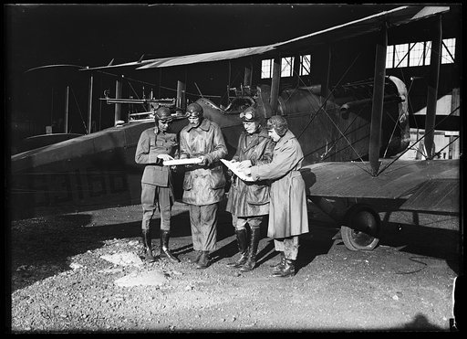 Group next to airplane