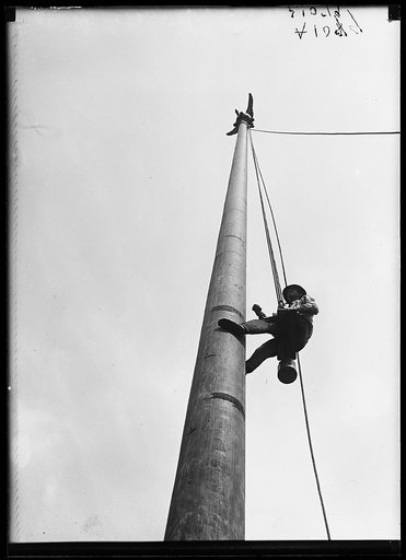 Worker suspended from flagpole at Union Station, Washington, D.C.