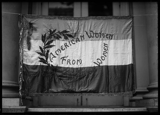 Emmons K. Ellsworth, acting director of the Council of National Defense with flag]] "To American Women from Armenian Women'