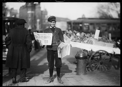 Newsboy holding The Washington Times, Washington, D.C.