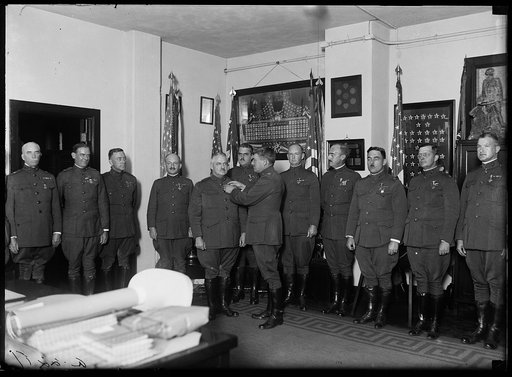 Officers of the Marines being awarded the Navy Cross or the Navy Distinguised Service Medal