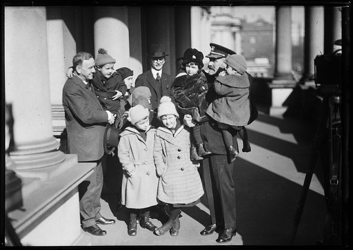 Josephus Daniels, left and group of children