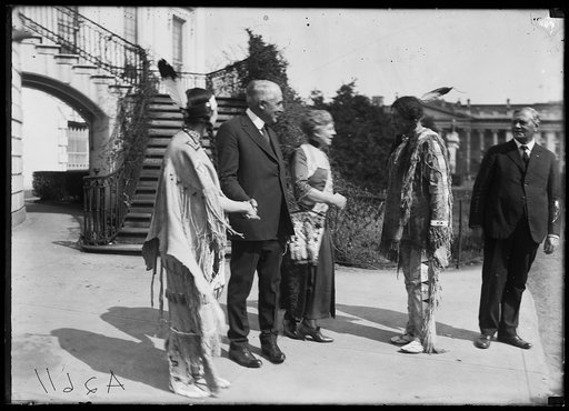 President and Mrs. Harding with Native Americans outside White House, Washington, D.C.