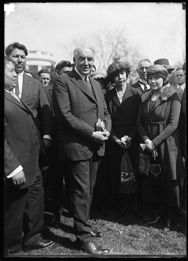 President Harding and group; White House in background, Washington, D.C.