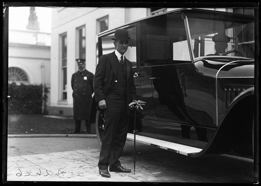 Man with automobile at White House, Washington, D.C.