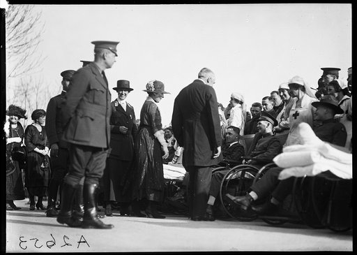 President and Mrs. Harding greet disabled men