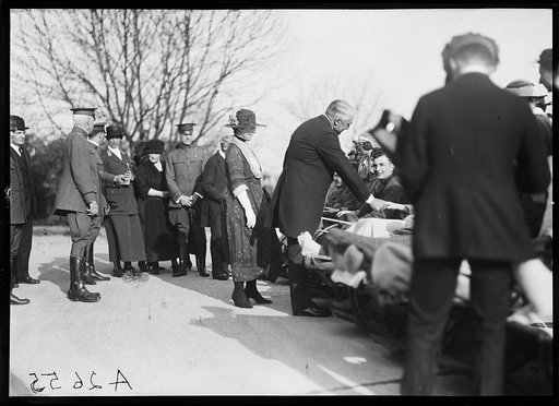 President and Mrs. Harding greet disabled men